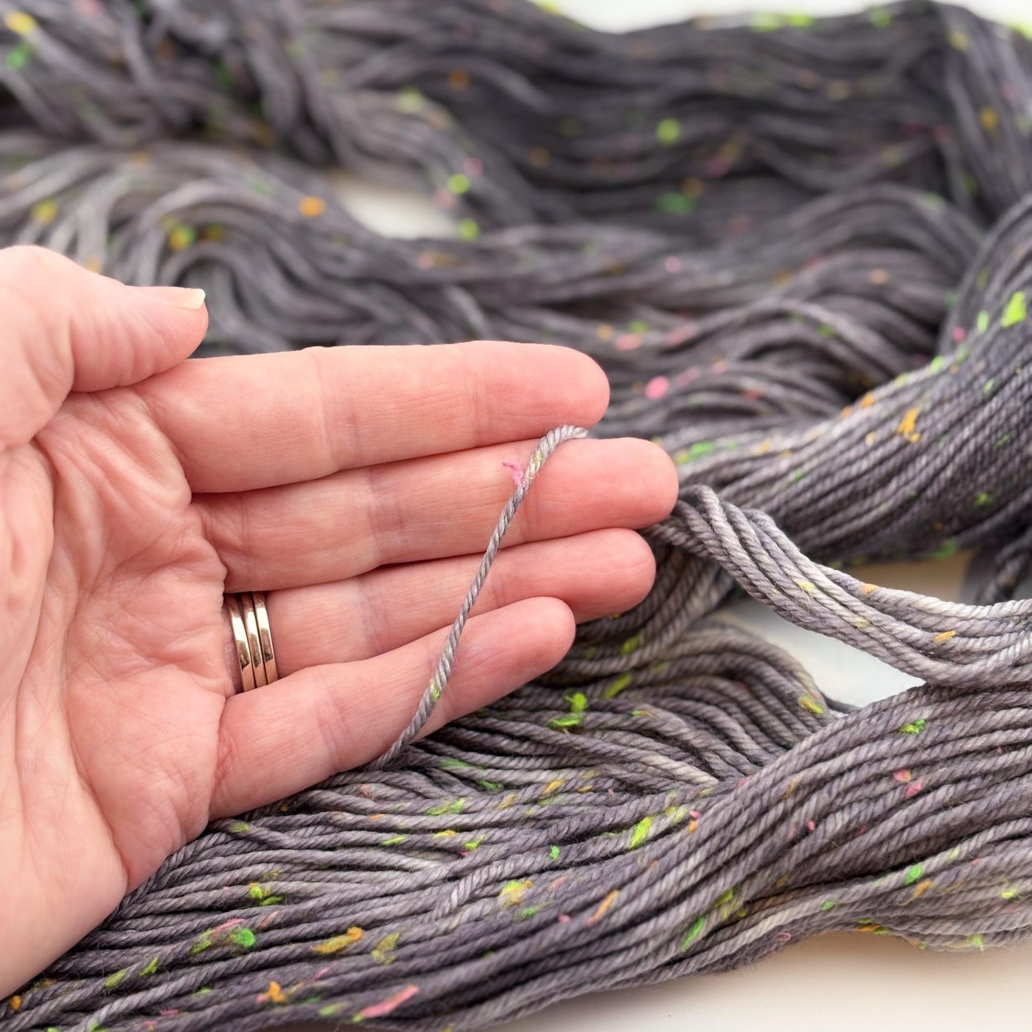 Hand Dyed Yarn, DK Weight, Superwash Merino and Neon Donegal Nep in Black Light