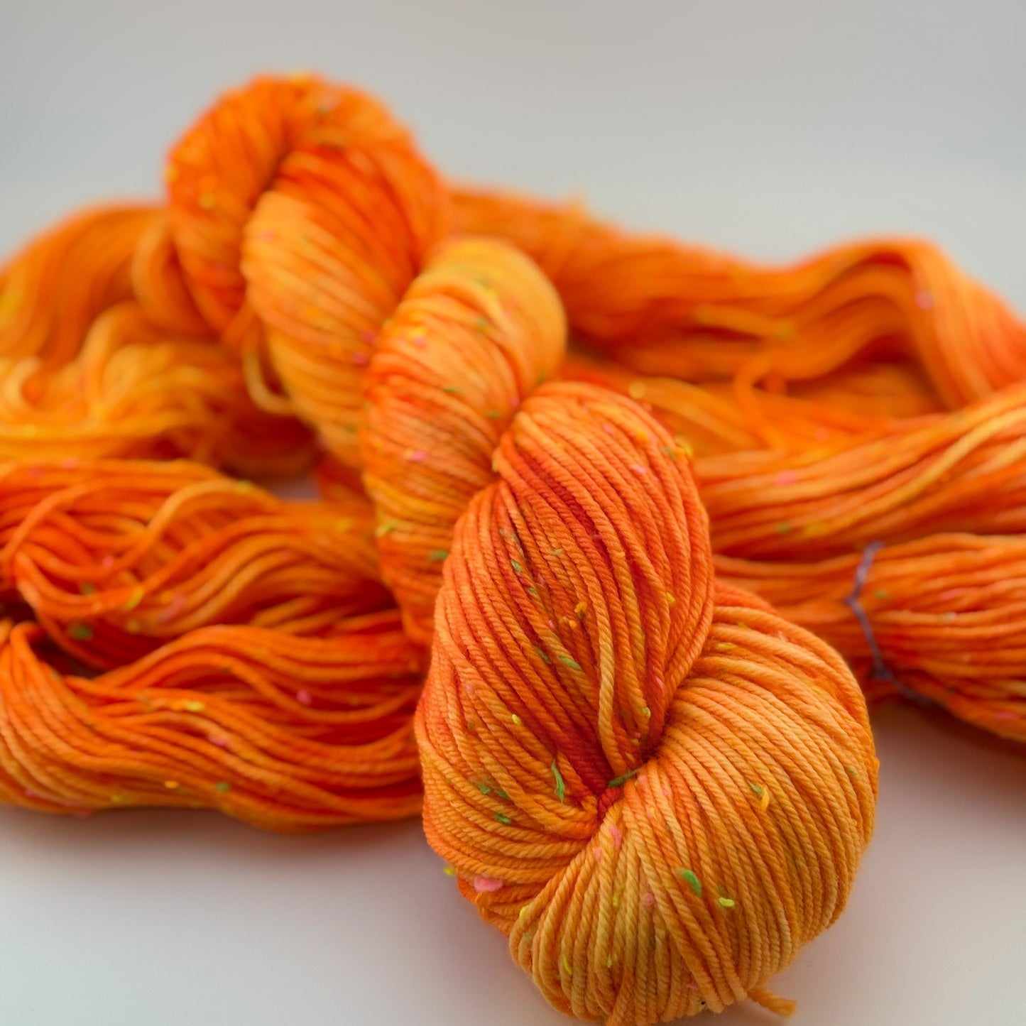 Hand Dyed Yarn, DK Weight, Superwash Merino and Neon Donegal Nep in Safety Orange