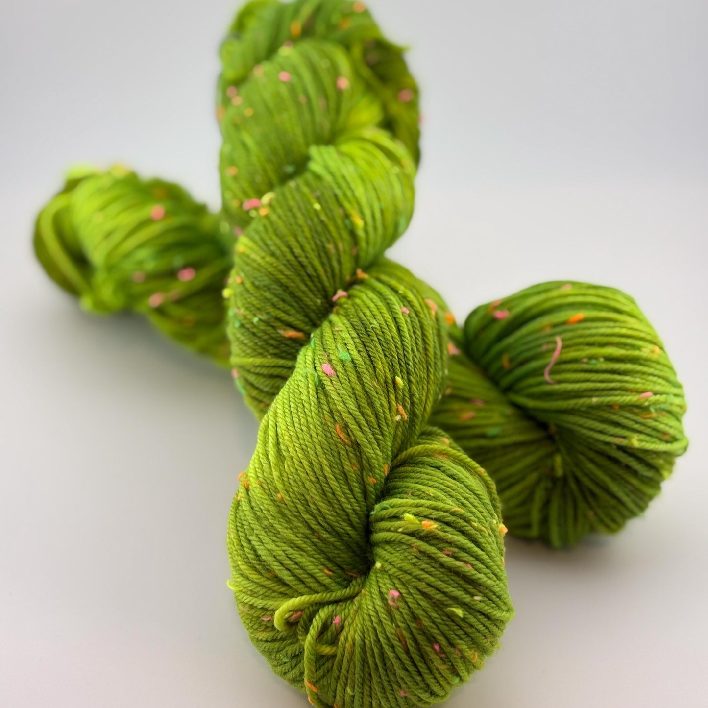 Hand Dyed Yarn, DK Weight, Superwash Merino and Neon Donegal Nep in Radioactive