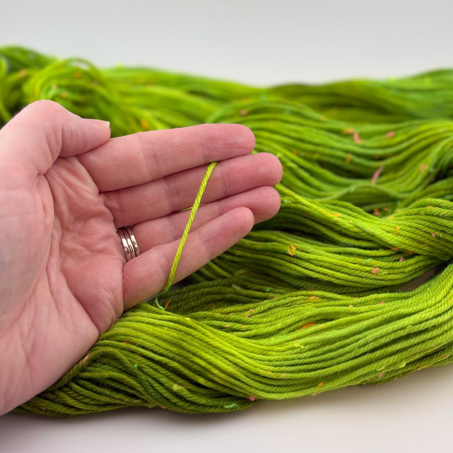 Hand Dyed Yarn, DK Weight, Superwash Merino and Neon Donegal Nep in Radioactive