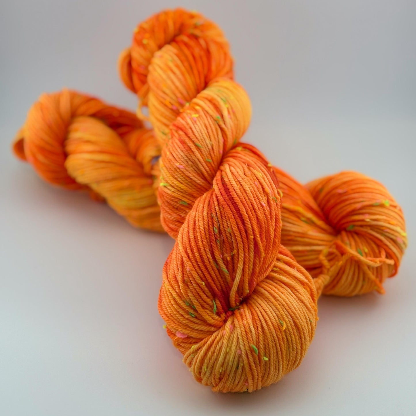 Hand Dyed Yarn, DK Weight, Superwash Merino and Neon Donegal Nep in Safety Orange