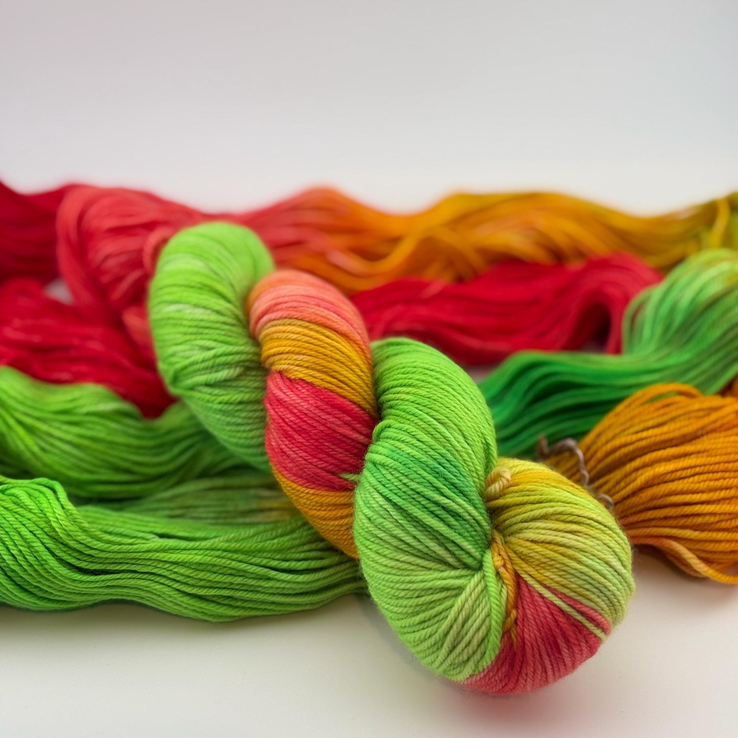 Hand Dyed Yarn, DK Weight, Superwash Merino, Cashmere, and Nylon in Bright Christmas