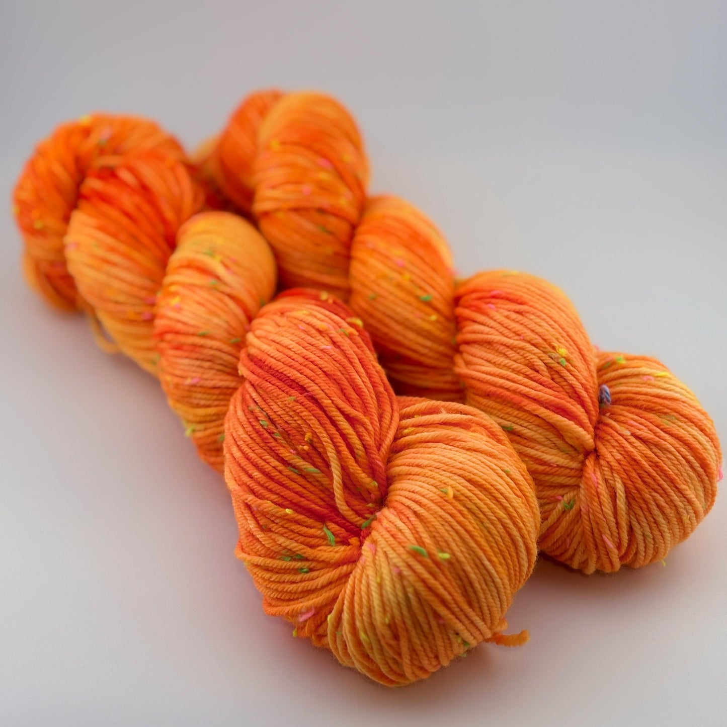 Hand Dyed Yarn, DK Weight, Superwash Merino and Neon Donegal Nep in Safety Orange