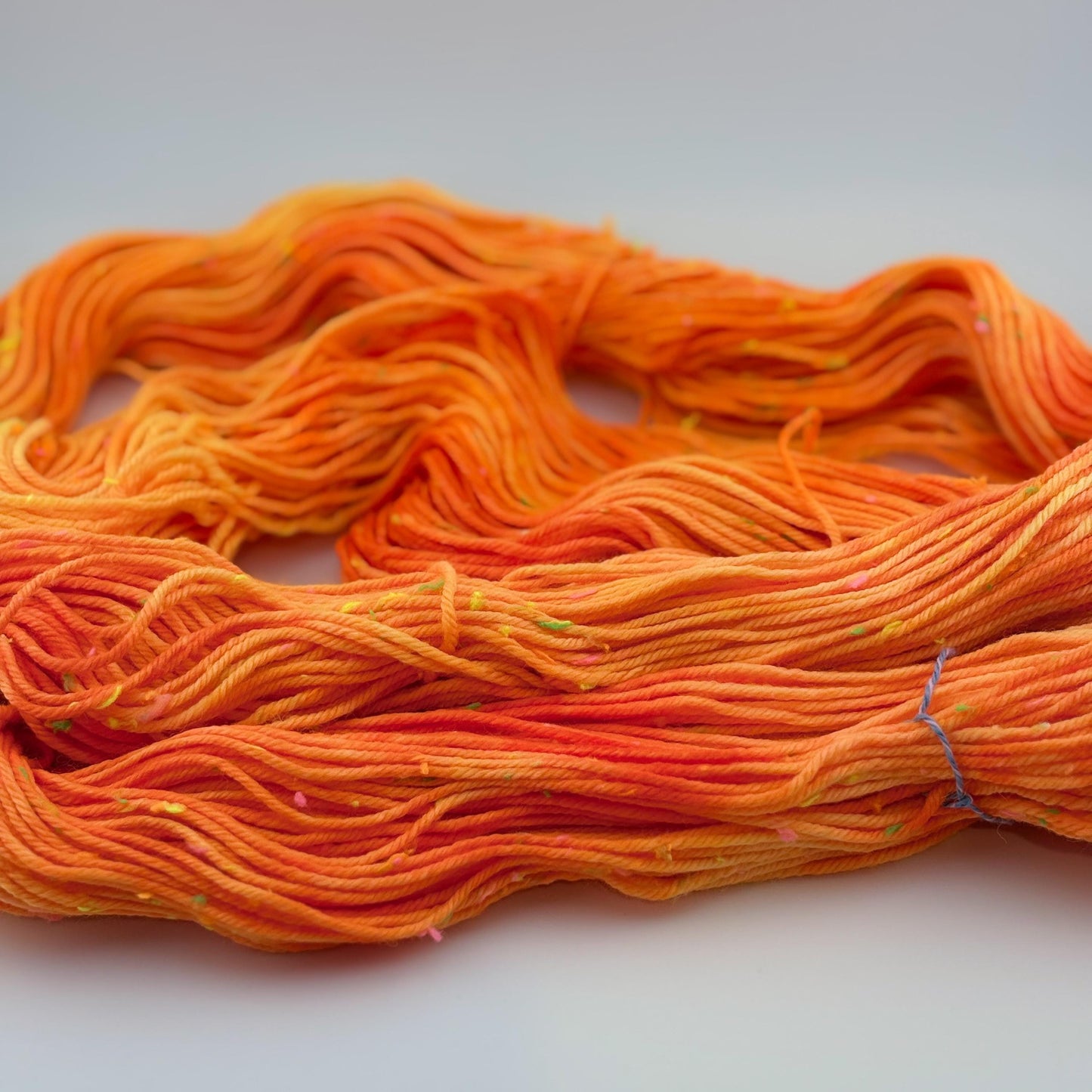 Hand Dyed Yarn, DK Weight, Superwash Merino and Neon Donegal Nep in Safety Orange