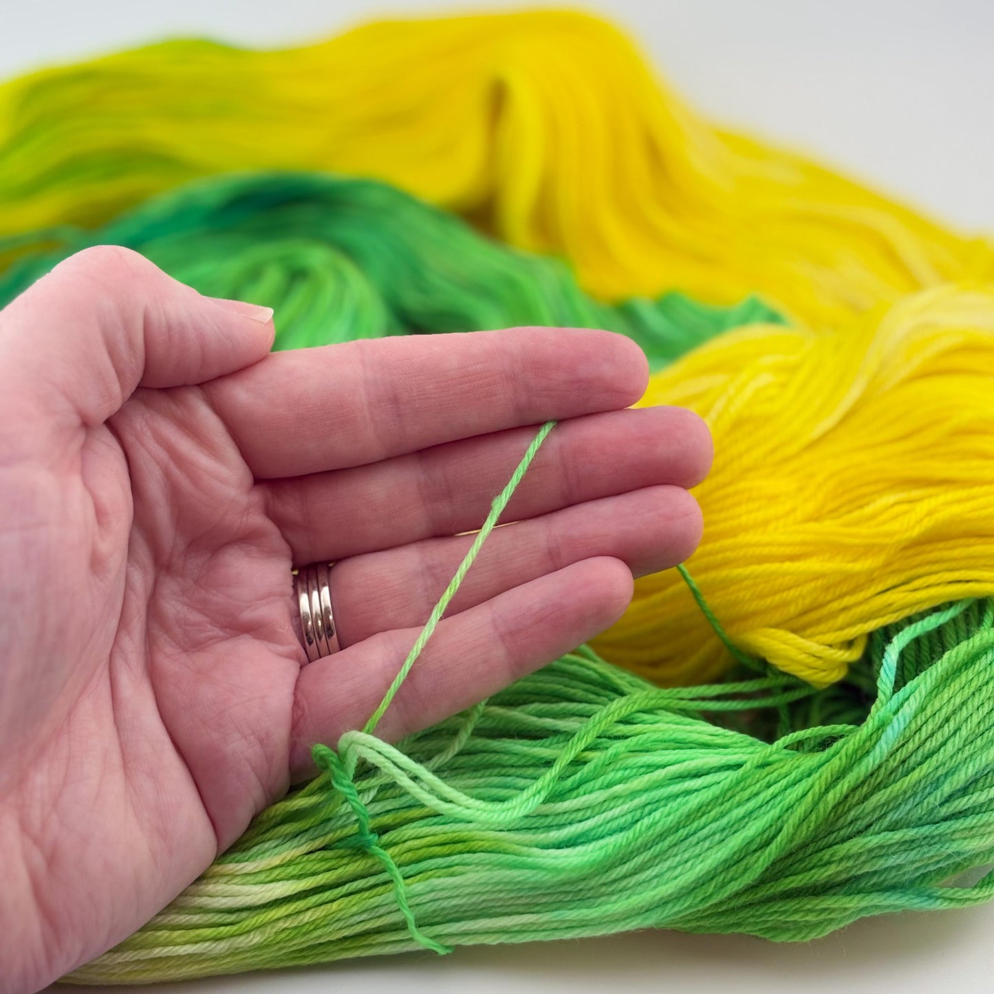 Hand Dyed Yarn, Fingering Weight, Superwash Merino, Cashmere, and Nylon in Lemon Lime