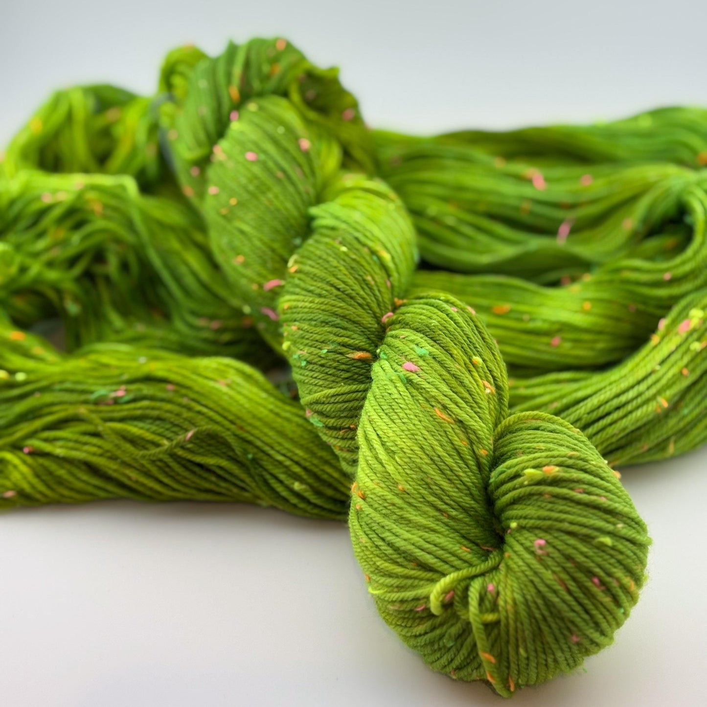 Hand Dyed Yarn, DK Weight, Superwash Merino and Neon Donegal Nep in Radioactive